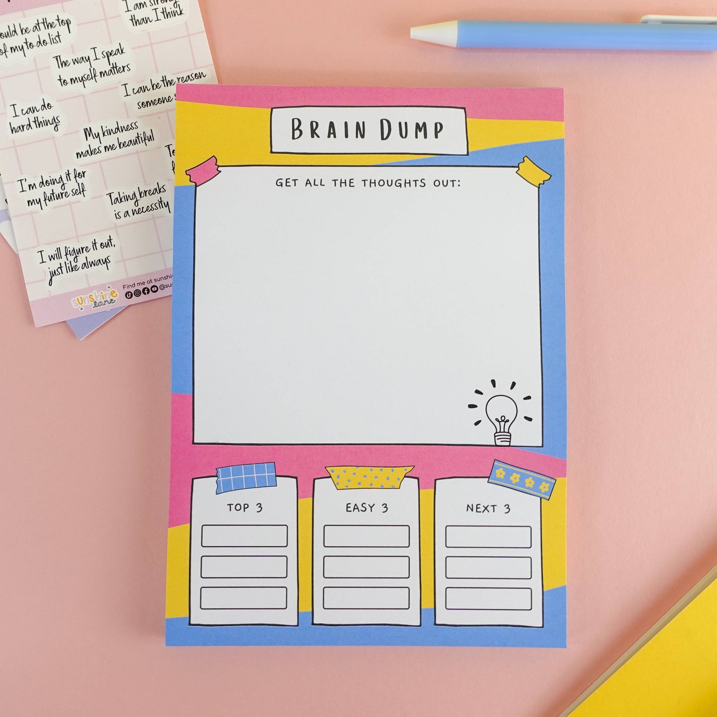 ADHD A5 brain dump notepad with 'Brain Dump' design on a pink background