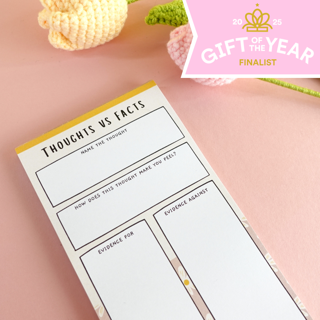 ADHD notepad titled 'Thoughts vs Facts' on a pink background with decorative elements & "Gift of the Year Finalist 2025" banner